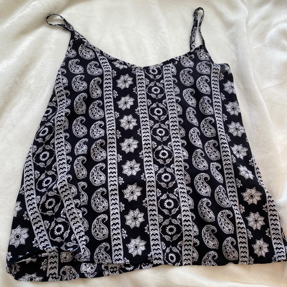 black and with loose tank top